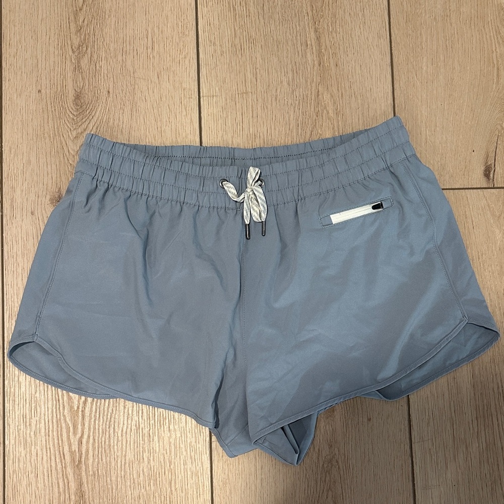 Vuori Women's Light Slate Athletic Shorts in Blue